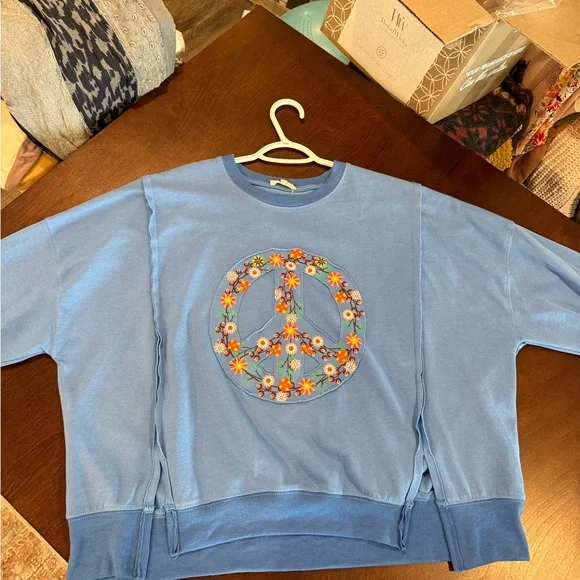 Easel Blue Top with Vibrant Floral Peace Sign Design - Picture 12 of 12
